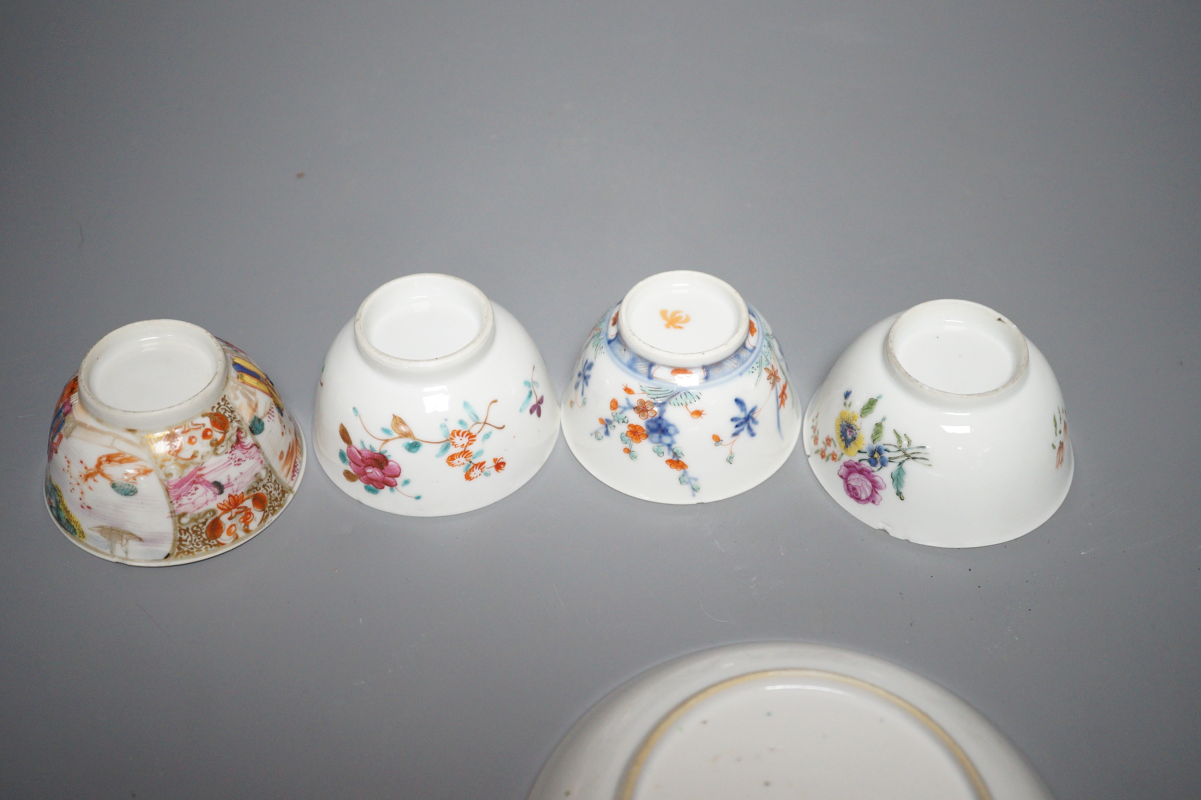 A 19th century Chinese Tobacco Leaf pattern saucer and four various teabowls